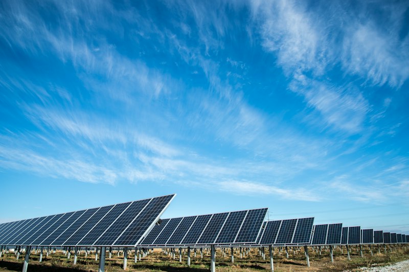 Solar panels being mounted on a house roof